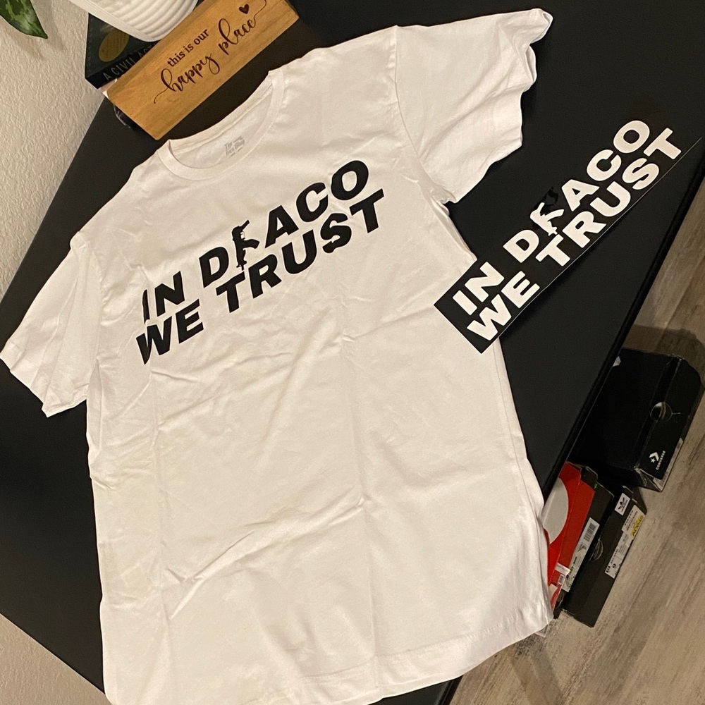 White Graphic T-Shirt with 'In Draco We Trust' Print